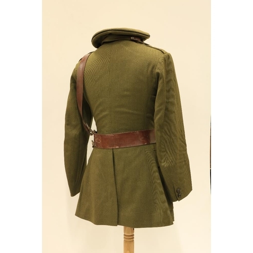 954 - Two green Khaki British Army Uniforms, by Peal & Co., London, early to mid - 20th Century; three... 