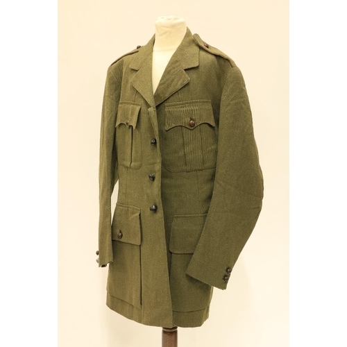 954 - Two green Khaki British Army Uniforms, by Peal & Co., London, early to mid - 20th Century; three... 