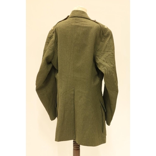 954 - Two green Khaki British Army Uniforms, by Peal & Co., London, early to mid - 20th Century; three... 