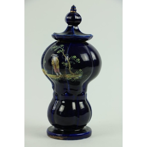 111 - A rare early 19th Century dark blue Continental porcelain 'pagoda' shaped Vase and Cover, with chino... 