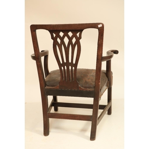 217 - An early Georgian period mahogany framed Carver Armchair, the square back with pierced decorated spl... 