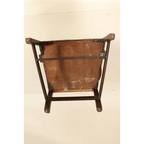 217 - An early Georgian period mahogany framed Carver Armchair, the square back with pierced decorated spl... 