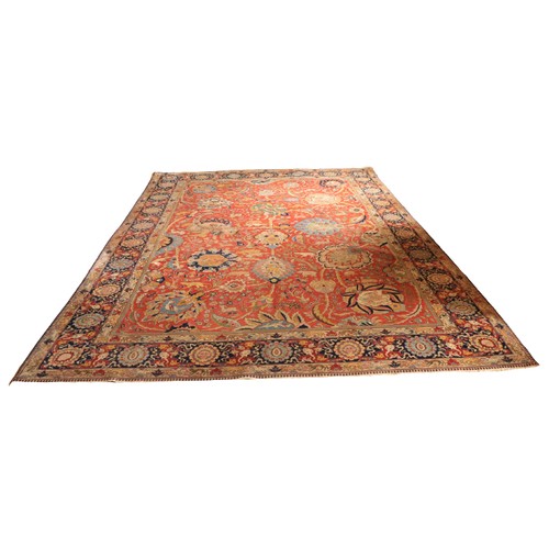 382 - A magnificent Persian polychrome semi-antique Carpet, the red ground profusely decorated with images... 