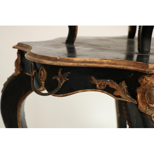 292 - An attractive 19th Century ebonised and gilt decorated two tier Centre Table, with graduating platfo... 