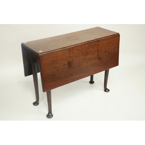 311 - An Irish mahogany drop leaf Table, 18th Century, with rectangular flaps on four tapering turned legs... 