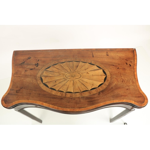 312 - A fine Irish George III period serpentine shaped inlaid mahogany fold-over Card Table, in the manner... 