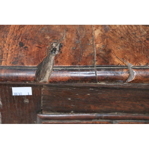 341 - An 18th Century oak Dresser Base, with plank top above three frieze drawers on turned legs, 63