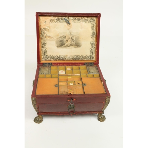 481 - A very unusual Regency period leather bound ladies Sewing Casket, with brass mounts, the hinged top ... 