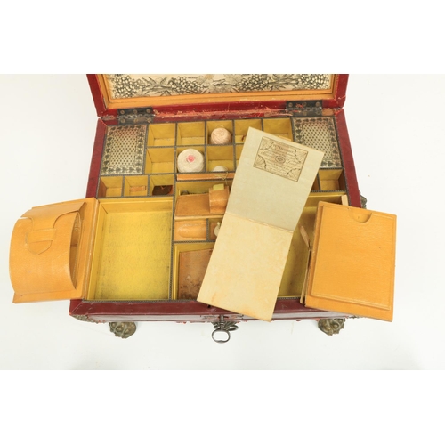 481 - A very unusual Regency period leather bound ladies Sewing Casket, with brass mounts, the hinged top ... 