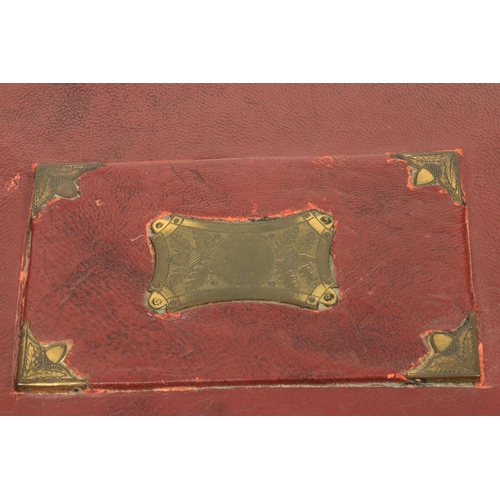 481 - A very unusual Regency period leather bound ladies Sewing Casket, with brass mounts, the hinged top ... 