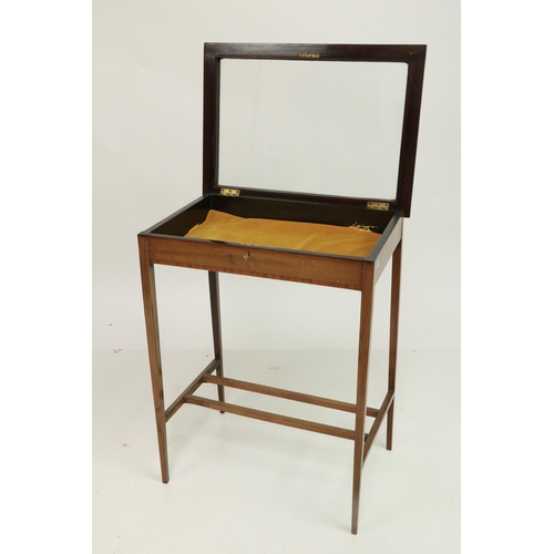 494 - A rectangular mahogany and kingwood banded Curio Display Table, with glazed and hinged top on square... 