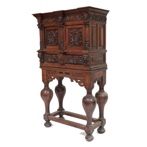 566 - An attractive 19th Century heavily carved Cupboard on Stand, in the Renaissance style, with double i... 