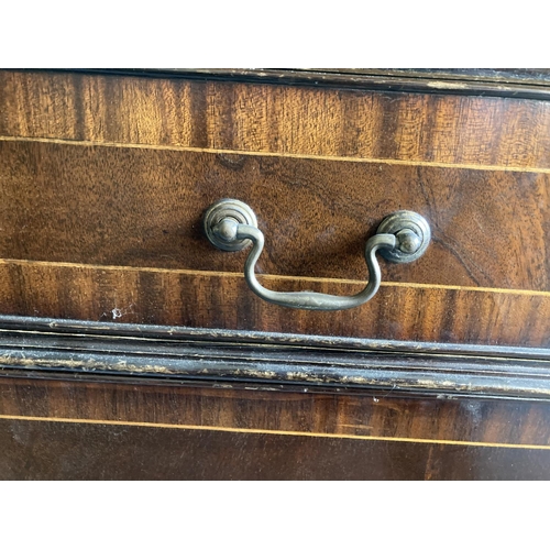 244 - A modern inlaid mahogany Side Cupboard, with three frieze drawers and three cupboard doors on bracke... 