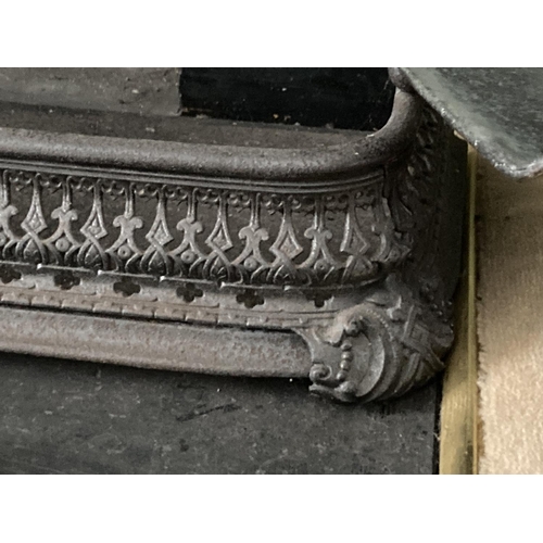 291 - A Victorian pierced cast iron Fender, 48