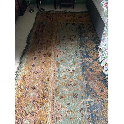 298 - A large Turkish Ushak wool Carpet, with all over pattern of stylized flowers and hooked gulls on a d... 