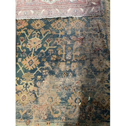 298 - A large Turkish Ushak wool Carpet, with all over pattern of stylized flowers and hooked gulls on a d... 