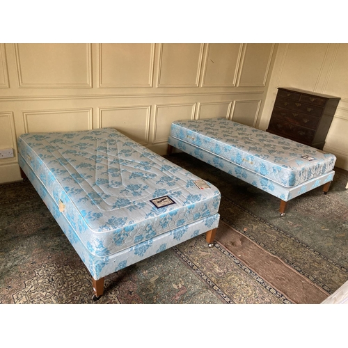 300 - Two single Beds, by Hiltonia, covered in blue fabric, 6' x 3', sold as a lot, w.a.f. (2)... 