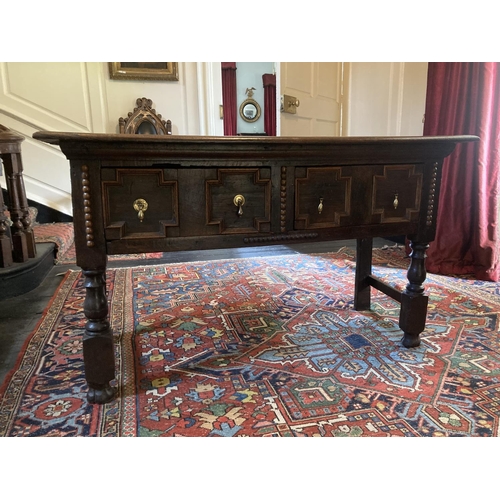 340 - An 18th Century Jacobean style oak Side Table, the plain top over two frieze drawers decorated with ... 