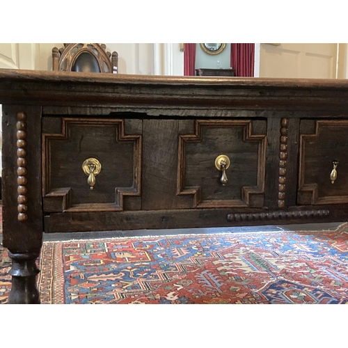 340 - An 18th Century Jacobean style oak Side Table, the plain top over two frieze drawers decorated with ... 