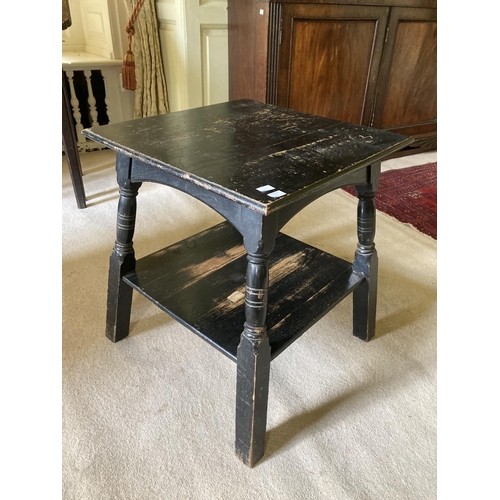 349 - A small square ebonised two tier Aesthetic movement Occasional Table, on four turned legs, united by... 