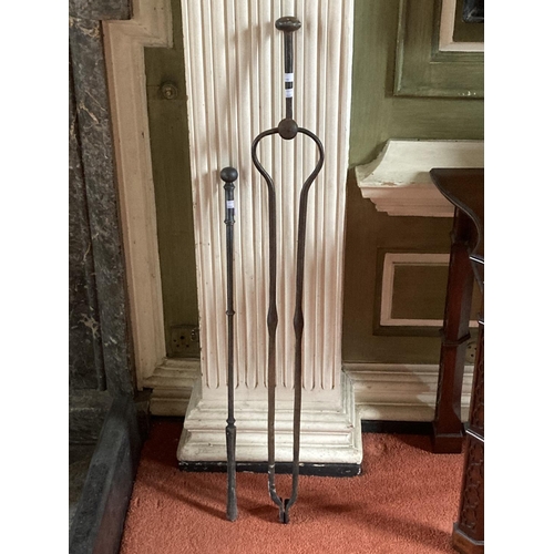 410 - A large early heavy cast iron Fire Tongs, with knop finial and baluster shanks, approx. 45