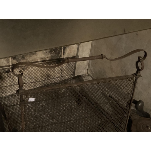 427 - A small cast iron Fender, with open top rail, a wire mesh Spark Guard, a pair of Andirons, and a Bel... 