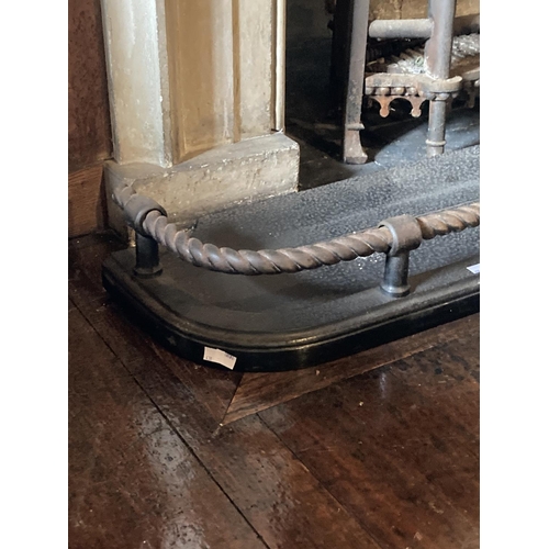 438 - WITHDRAWN...A 19th Century cast iron Fender, with rope cast top rail and moulded base, 6' (183cms) w... 