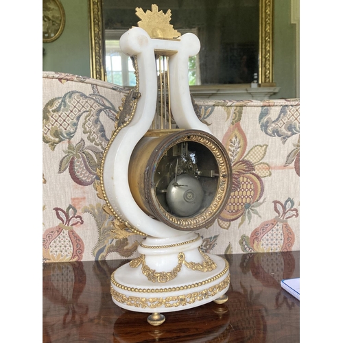 449 - A fine 19th Century French white marble and ormolu lyre Mantle Clock, the French movement with an ou... 