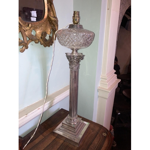 534 - A very heavy and fine quality silver plated Lamp, modelled as a Corinthian column with cutglass bowl... 