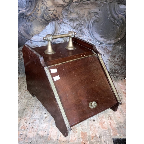 536 - An Edwardian slope fronted brass mounted walnut Coal Scuttle, together with a carved Fire Bellows (a... 