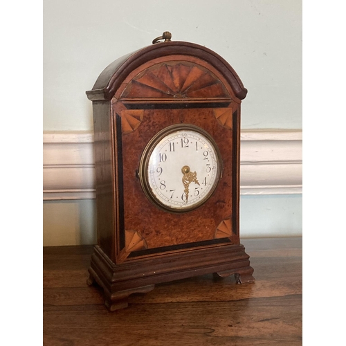 540 - An attractive 19th Century walnut and inlaid Mantel Clock, the arched top with sunburst design over ... 