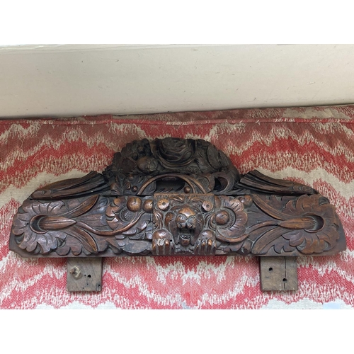 554 - Two early carved oak Capitals or Picture Mounts, one depicting acanthus leaf, pineapple and foliage,... 