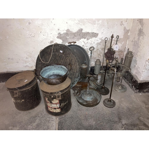 612 - A quantity of old metal or brass Desk Lamps, two brass gong drums, an oval copper two handled pan an... 