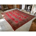 A large semi-antique Turkish Ushak, with geometric design centre and with conforming border, approx.... 