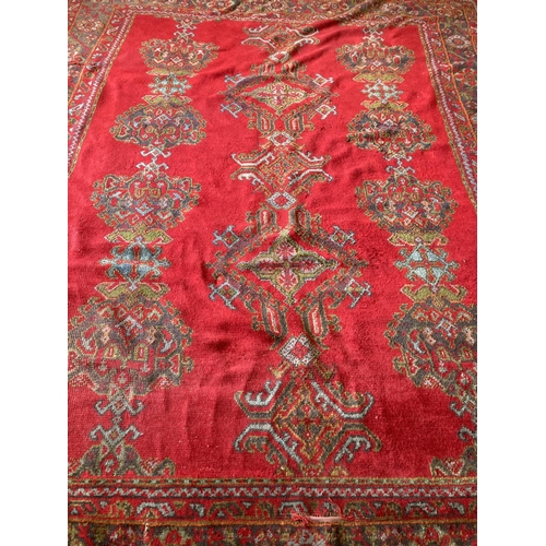 472 - A large semi-antique Turkish Ushak, with geometric design centre and with conforming border, approx.... 