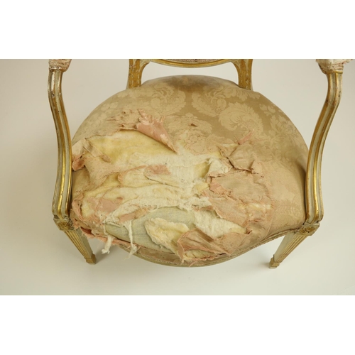 497 - A George III cream painted and parcel gilt Open Armchair, with moulded oval padded back and moulded ... 