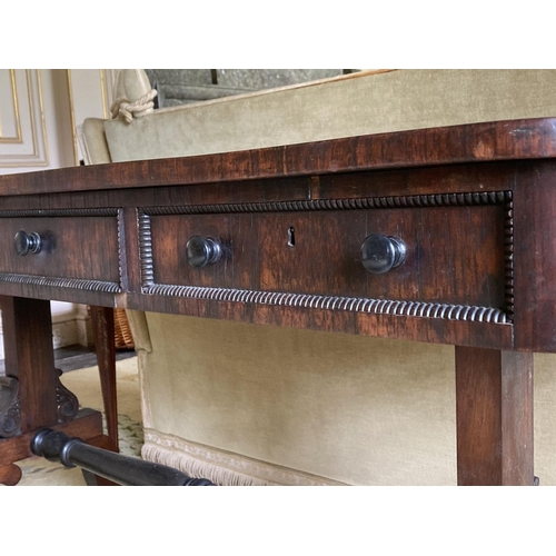 501 - A fine Irish late Regency rosewood Library Table, by Gillingtons of Dublin No. 40066, stamped on one... 