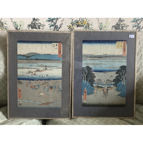 593 - A pair of Japanese Wood Blocks. (2)