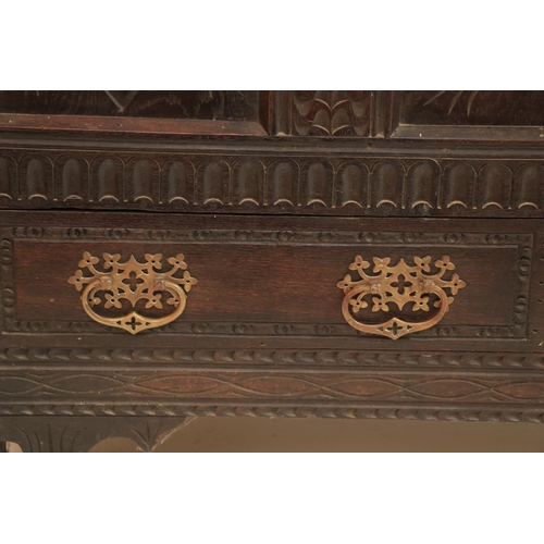 627 - An early 18th Century oak Coffer, the top with three recessed panels, and a moulded rim, above a fro... 