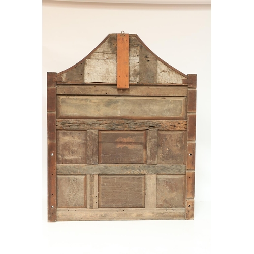 630 - A 17th Century and later carved oak Overmantel Panel, the shaped capital with shield centre above ei... 