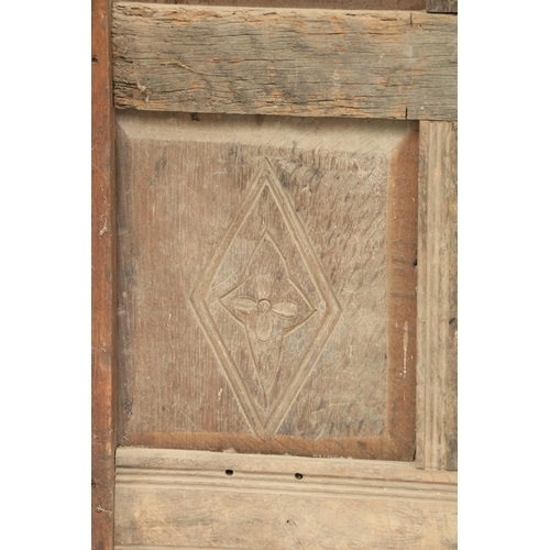 630 - A 17th Century and later carved oak Overmantel Panel, the shaped capital with shield centre above ei... 