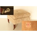 A fine quality Howard & Sons Ltd, London Footstool, covered in cream damask fabric and loose cus... 