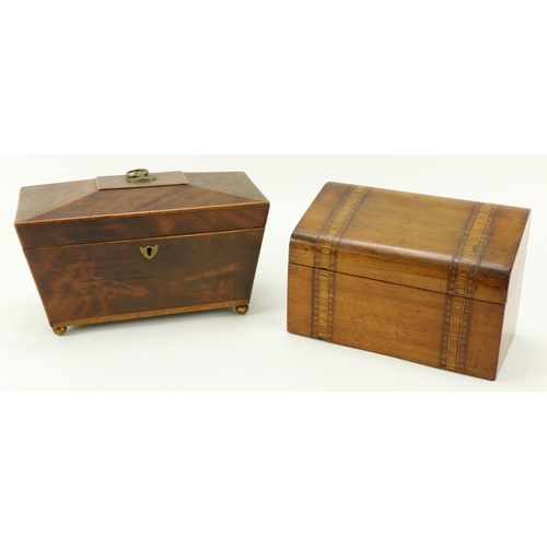 15 - A 19th Century rectangular inlaid mahogany casket shaped Tea Caddy, with brass ring handles and bras... 