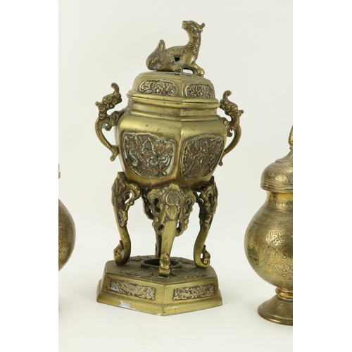 16 - A pierced and embossed Oriental brass Incense Burner and Cover, and two pairs of Benares brass Vases... 