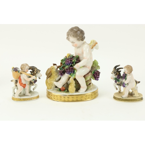 17 - An early 19th Century porcelain Figure of Cupid, holding grapes and two begging rabbits; a pair of s... 