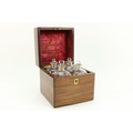 An attractive and fine quality small Georgian period mahogany Decanter Box, with four original bottl... 