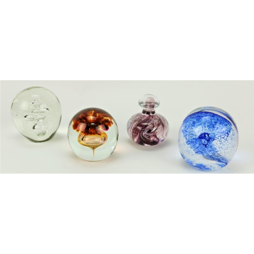 224 - Four assorted heavy glass Paper Weights. (4)