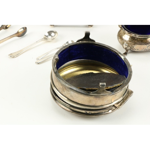 236 - A small oval silver Tea Caddy, London 1914, 70grams, a 6 piece Condiment Set, Birmingham 1916, 184 g... 