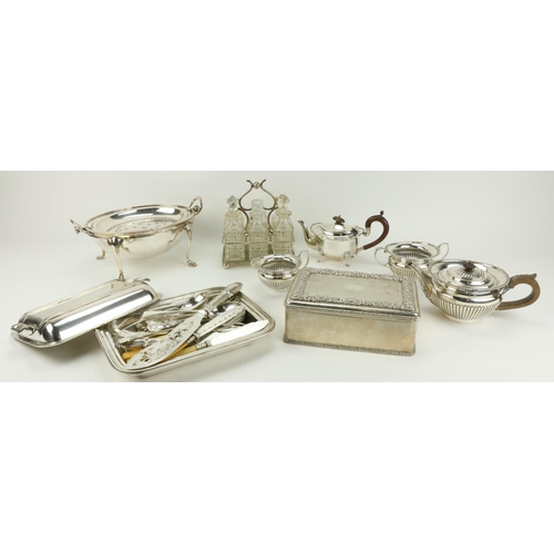 237 - A silver plated Entrée Dish and cover, a plated Condiment Set with glass bottles, and a collection o... 