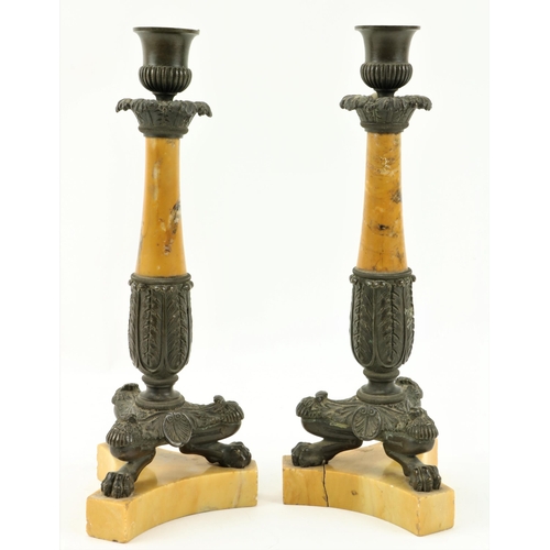 36 - A pair of Regency period bronze and Sienna marble Candlesticks, 28.5cms (11 1/4